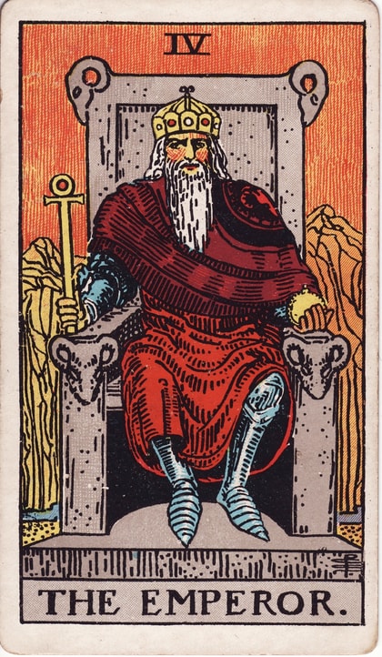 The Emperor, card IV, seated on a throne with ram-head carvings, holding a sceptre and globe.